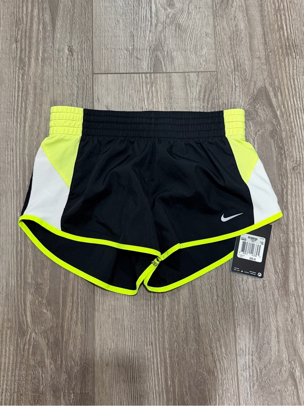 Nike Women's Black Shorts with Neon Yellow Trim